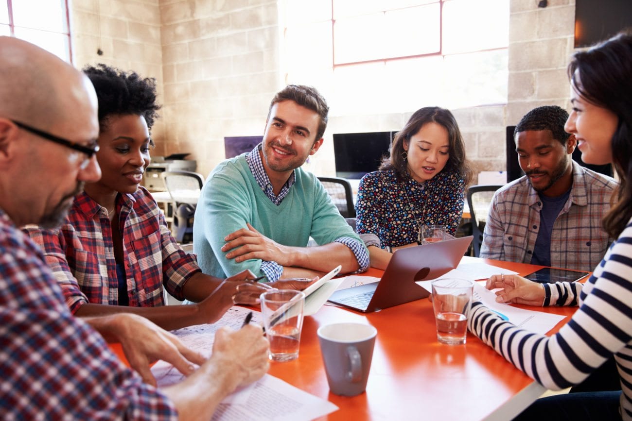 Employees engaging in a meeting because they have trust in the company