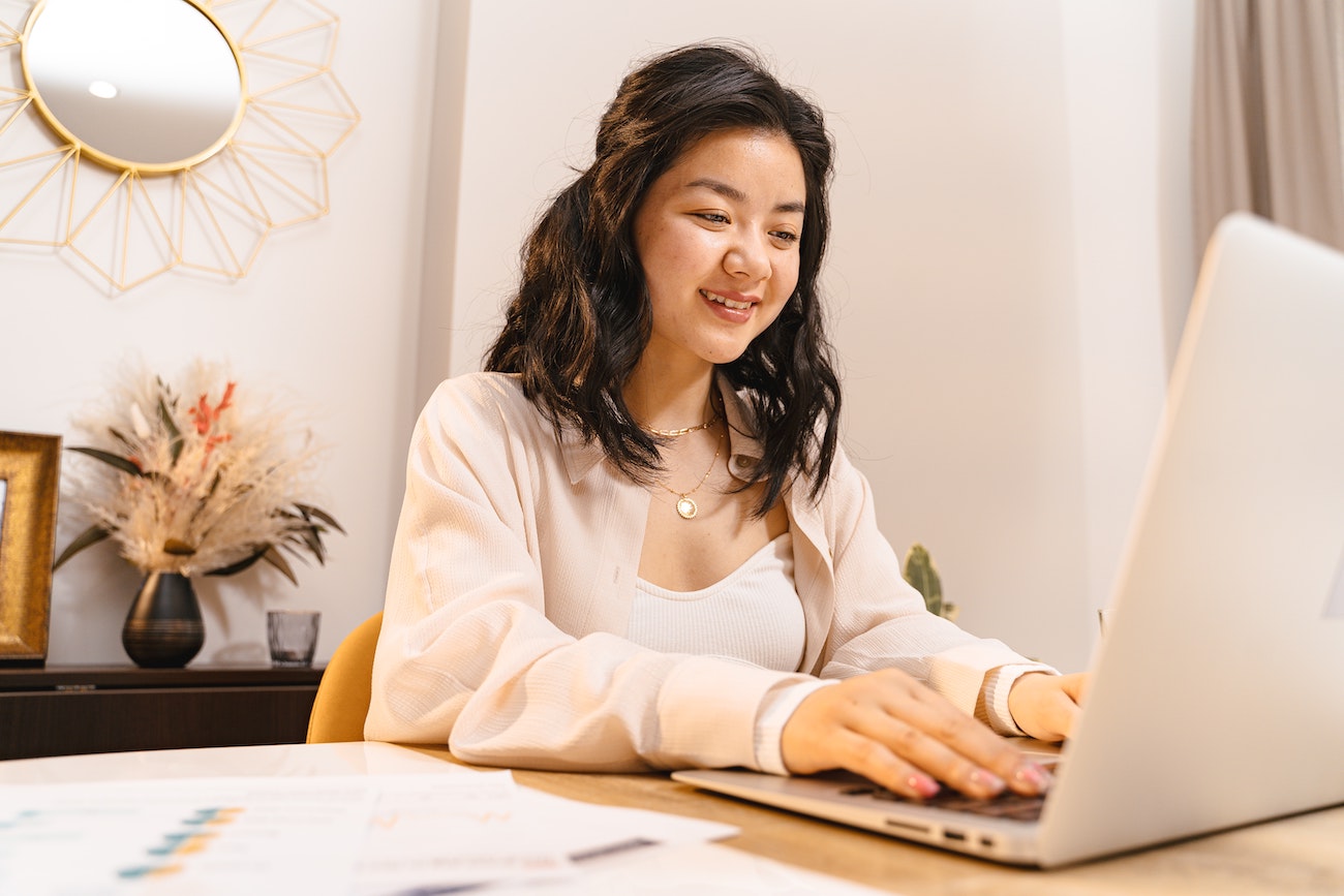 employee typing at computer