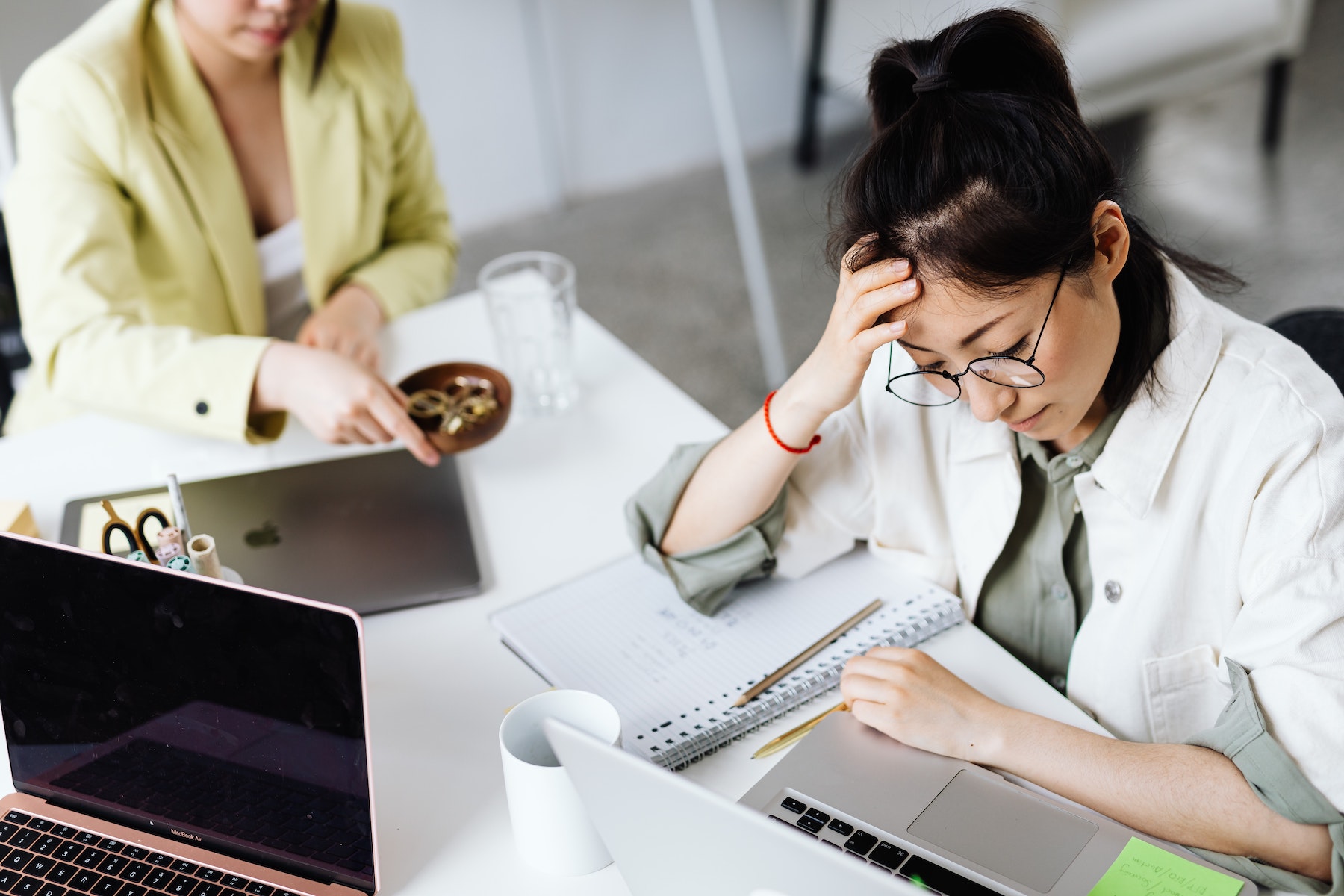 Stressed employee working at laptop