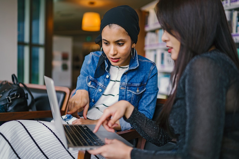 Employees looking at computer