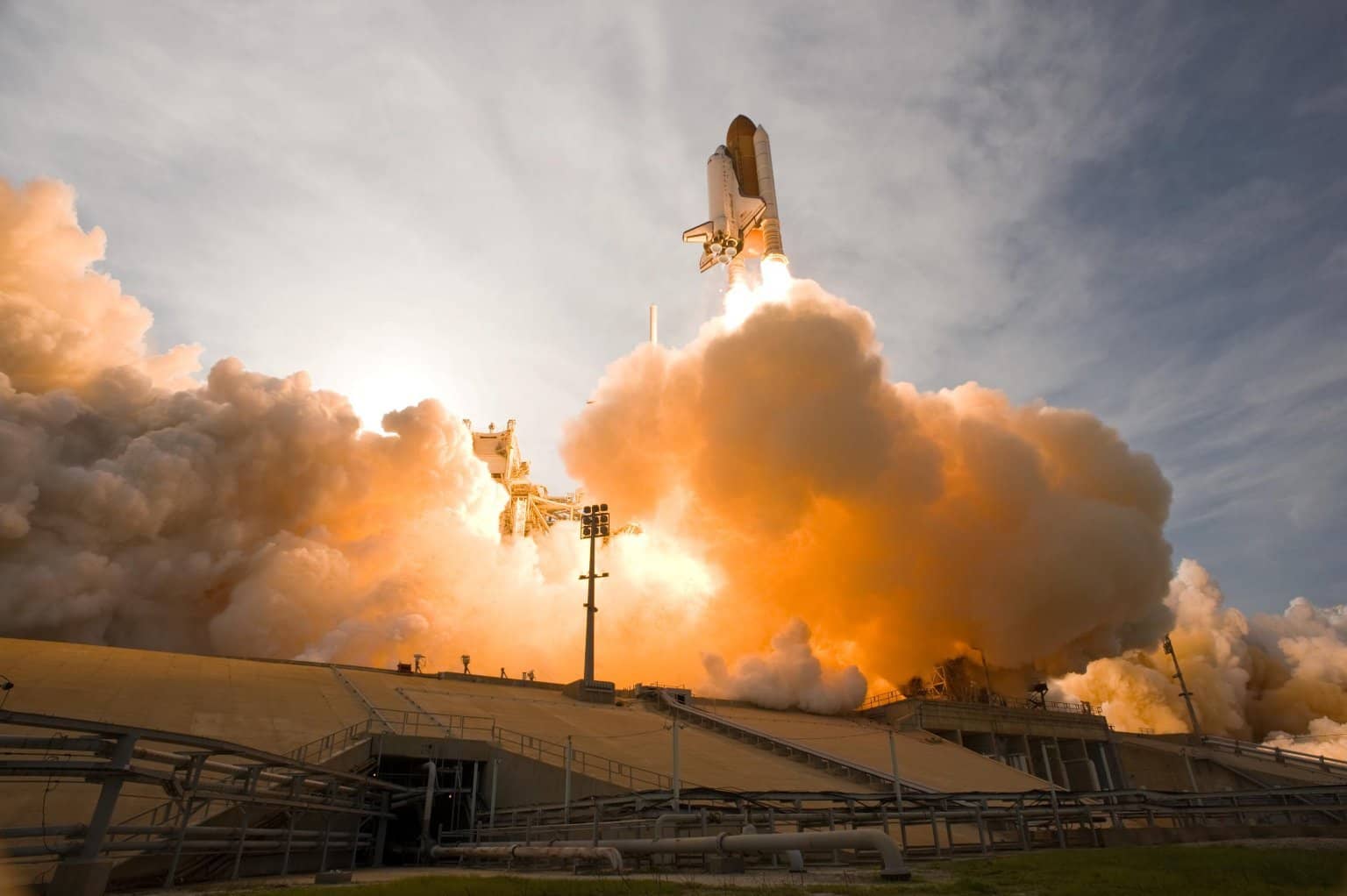 A spaceship launching, representing an Employee Feedback Action Plan